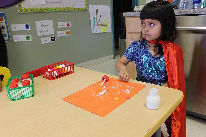 Alexis plays arts and crafts at Conjunto preschool in Española where the program is tailored for students who have experienced drug-related trauma. Alexis plays arts and crafts at Conjunto preschool in Española.