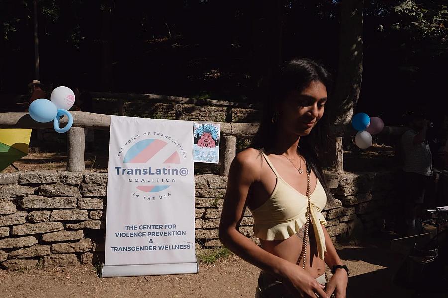 Image of a person with TransLatin banner in background