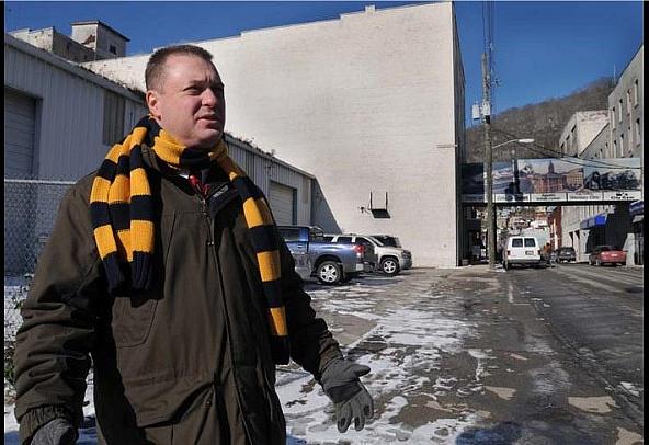 Mingo County Prosecuting Attorney Michael Sparks stands where hundreds of people once waited in line to see doctors at the Mountain Medical Clinic, an alleged pill mill that closed last year. Sparks says most crime in the area is caused by drugs.