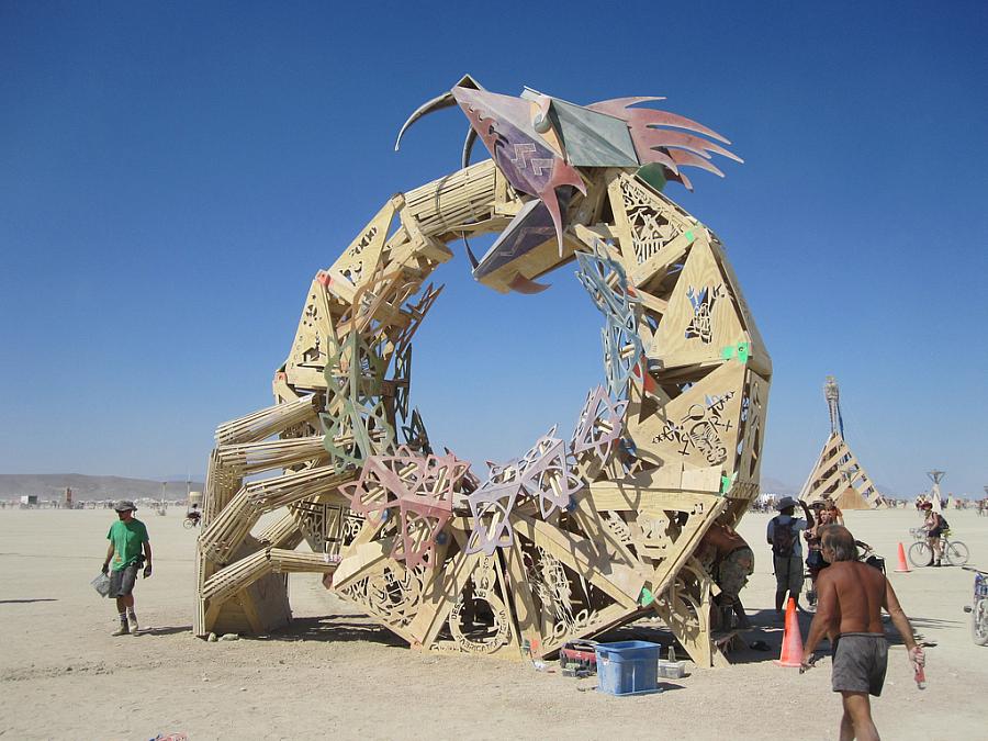 The events leading up to Dr. Charles Orlando Lewis finally losing his license puts our Antidote columnist in mind of the “ouroboros,” shown here in sculptural form at Burning Man.