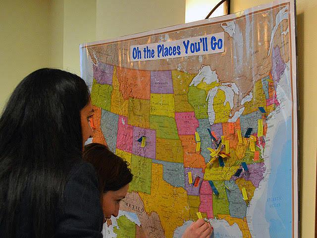Medical students in Louisville put their names on a U.S. map showing where they’re headed for the residencies.