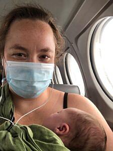 Megan Dean and her newborn daughter, Morwenna, on the way home from the hospital in a charter plane. (Megan Dean photo)