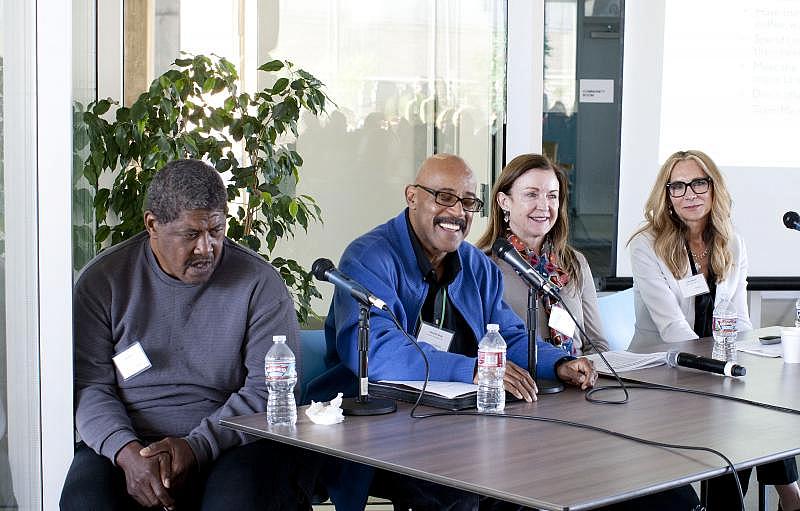 Case manager Maurice Gray of Exodus Recovery, second from left, speaks to journalists at Star Apartments. He’s joined by formerly homeless resident Joe Sims, nurse practitioner Nancy Richardson of Exodus, and Lezlie Murch, senior vice president of programs at Exodus, far right.