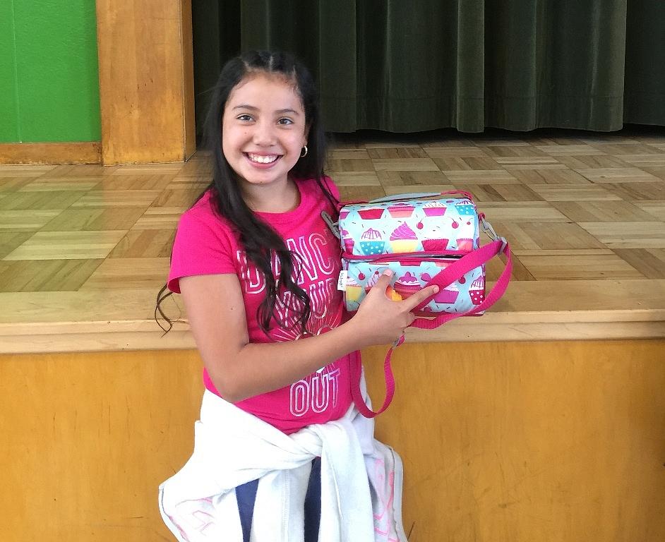 Pictured is Roseland Elementary fourth grader Brianna Chavez. She prefers to bring her own lunch to school. Maybe it's because of her cool lunchbox (Photo: Adia White / KRCB) Roseland Elementary Confronts Food Insecurity on First Day of School