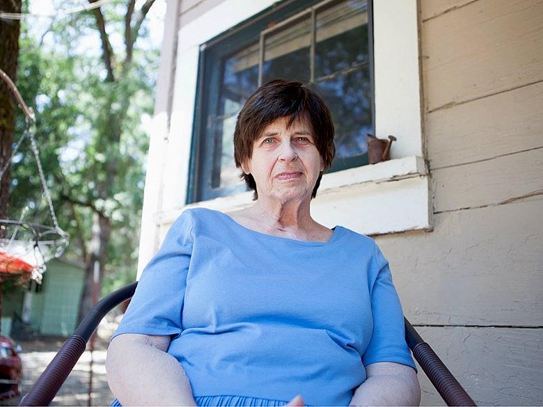 Heather Saxton, 72, lives in Fiddletown in a small cottage with her cat, Flower. “It’s such a basic need to socialize or to have people around," she said. "When one doesn’t, what’s the purpose?” (Vanessa S. Nelson/Capital Public Radio) Heather Saxton, 72, lives in Fiddletown in a small cottage with her cat, Flower. “It’s such a basic need to socialize or to have