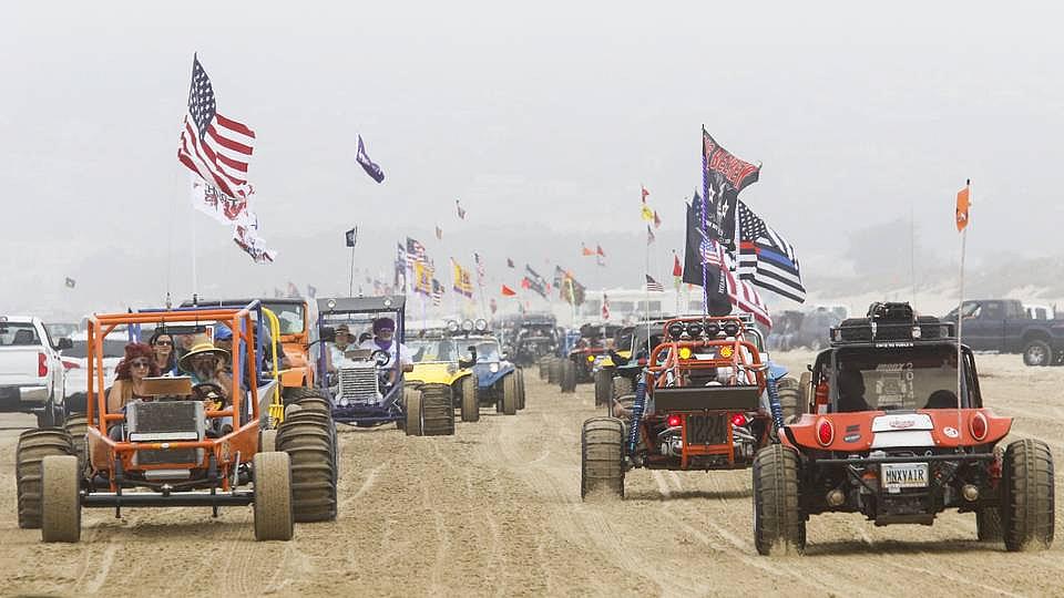 Hundreds of dune buggies paraded along the Oceano Dunes State Recreational Vehicle Area in 2018. David Middlecamp