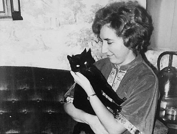 Colleen Loughman with one of her two cats, when she was a student in the 1950s at Holy Names University in Oakland. Loughman died in September 2017 from the heat, a day after San Francisco hit a record 106 degrees. (Photo: Barbara McGovern) Colleen Loughman with one of her two cats, when she was a student in the 1950s at Holy Names University in Oakland. Loughman die