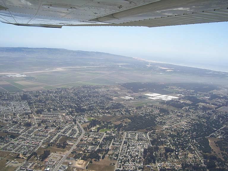 Aerial views of the Nipomo Mesa show a plume of dust that sweeps through the community on windy days.