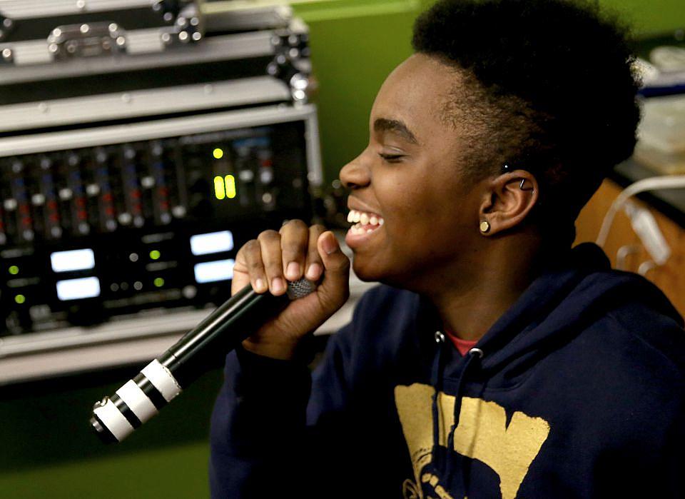 Ahdonis Gordon practices a song at his school MC2Stem. Ahdonis Gordon practices a song at his school MC2Stem.