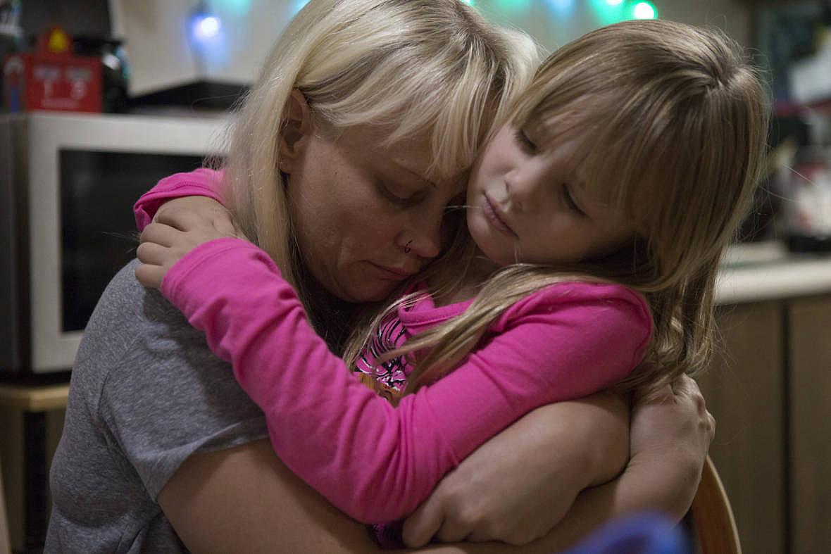 Sabrina Hanes and her daughter, Aroara, stay with friends in Chico following their evacuation from their home in Paradise during the Camp Fire on November 13, 2018. Hanes and her daughter escaped the fire with only two small backpacks of clothes and a few belongings, including a photo album. The home they rented for years burned down. Sabrina Hanes and her daughter, Aroara, stay with friends in Chico following their evacuation from their home in Paradise during