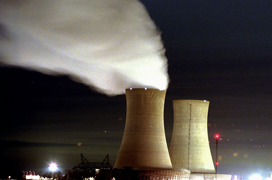 Clouds spew from a cooling tower at PECO’s nuclear generating station.