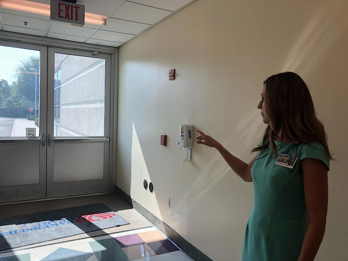 Michelle Oxford, CEO at Bakersfield Heart Hospital, shows where a gunman shot into the facility back in December of last year.