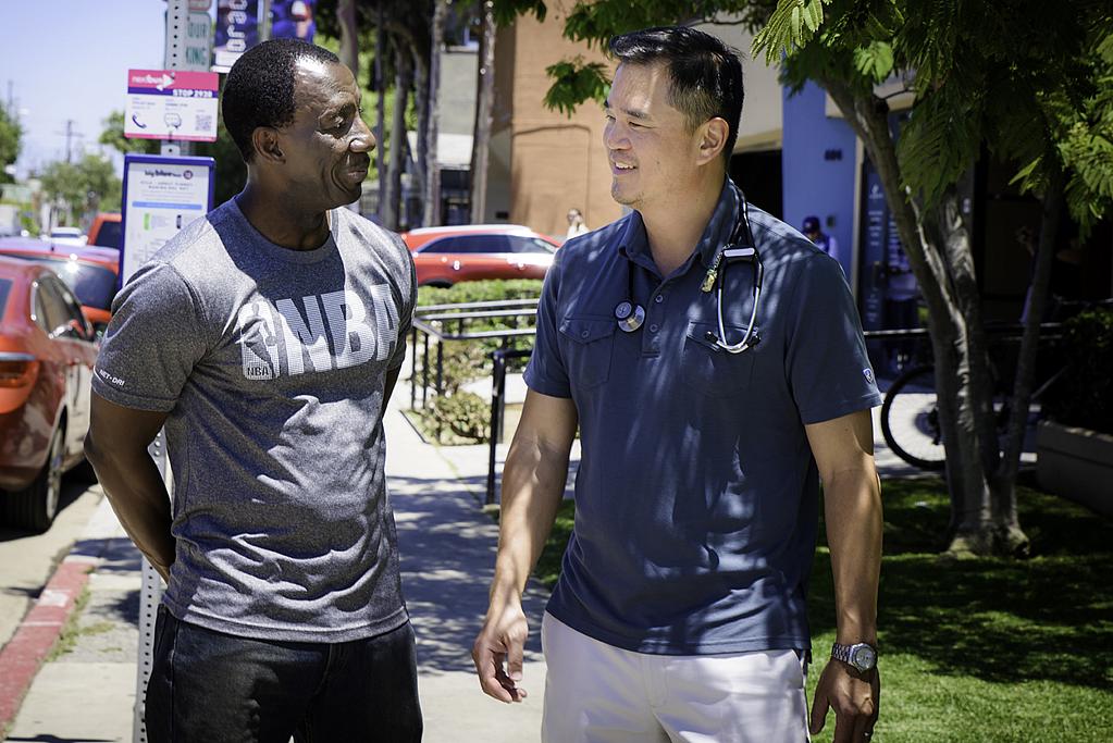 Kidney surgery paid for through Covered California gave Kenrick Bascom (left) a new lease on life. Photo by Maria Martin.