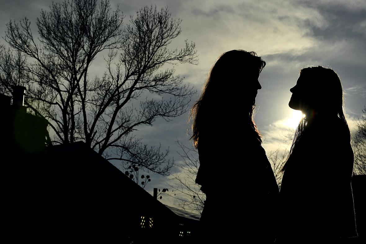 Jennifer, left, and her daughter Elizabeth, right, are pictured in their backyard on Feb. 23, 2020. Police were dispatched twice to check Elizabeth for self-inflicted cuts following Safe2Tell reports. Jennifer, left, and her daughter Elizabeth, right, are pictured in their backyard on Feb. 23, 2020. Police were dispatched twice