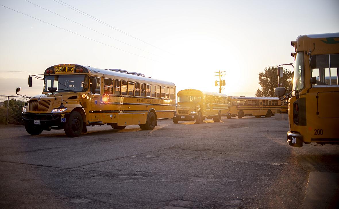 Buses head out on their morning routes at the Greeley-Evans School District 6 Fleet Maintenance Center in Greeley Aug. 19, 2020. Buses head out on their morning routes at the Greeley-Evans School District 6 Fleet Maintenance Center in Greeley Aug. 19, 2020.