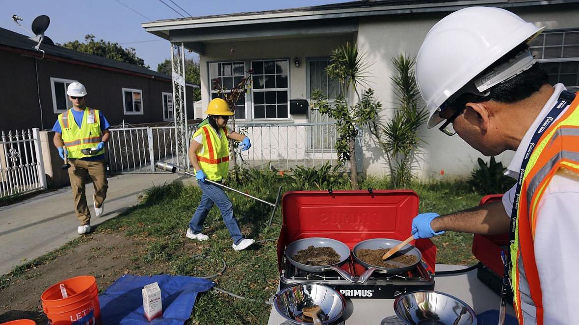 Bharat Dungrani, an environmental health specialist for the L.A. County Health Dept, removes moisture from soil samples collected in Commerce, Calif. on Feb. 29, 2016. The soil was then tested for possible lead contamination from the nearby and now closed Exide battery plant. Bharat Dungrani, an environmental health specialist for the L.A. County Health Dept, removes moisture from soil samples collecte
