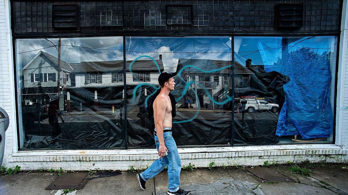 Travis Litts walks past an abandoned business along East Ridge Street in Lansford. He is one of Pennsylvania's many rural residents cut off from mental health and addiction treatment because of limited public transportation. Travis Litts walks past an abandoned business along East Ridge Street in Lansford. He is one of Pennsylvania's many rural reside