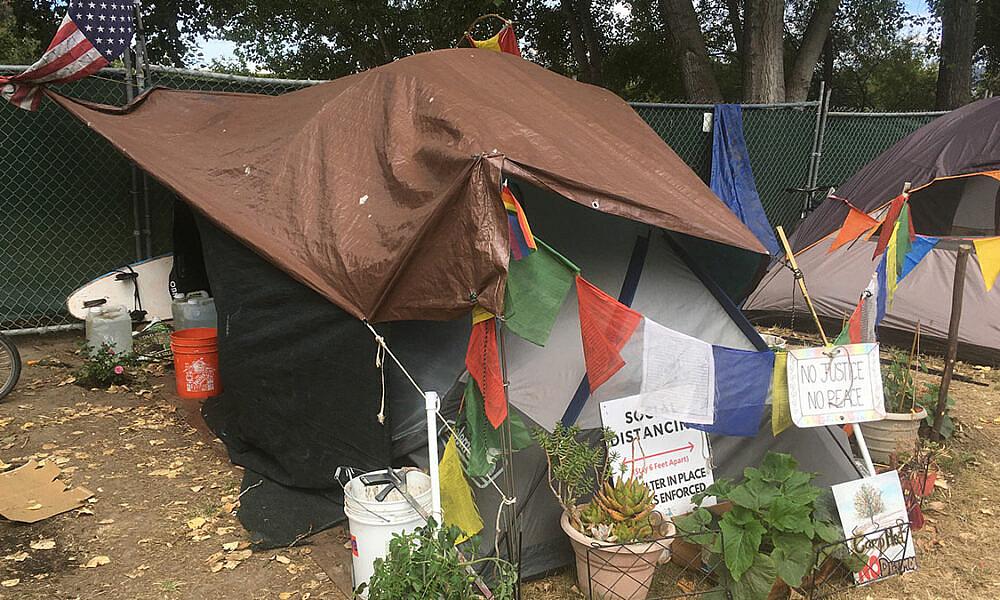 Residents of a new managed homeless camp at San Lorenzo Park have added the trappings of home to their tents. RESIDENTS OF A NEW MANAGED HOMELESS CAMP AT SAN LORENZO PARK HAVE ADDED THE TRAPPINGS OF HOME TO THEIR TENTS.
