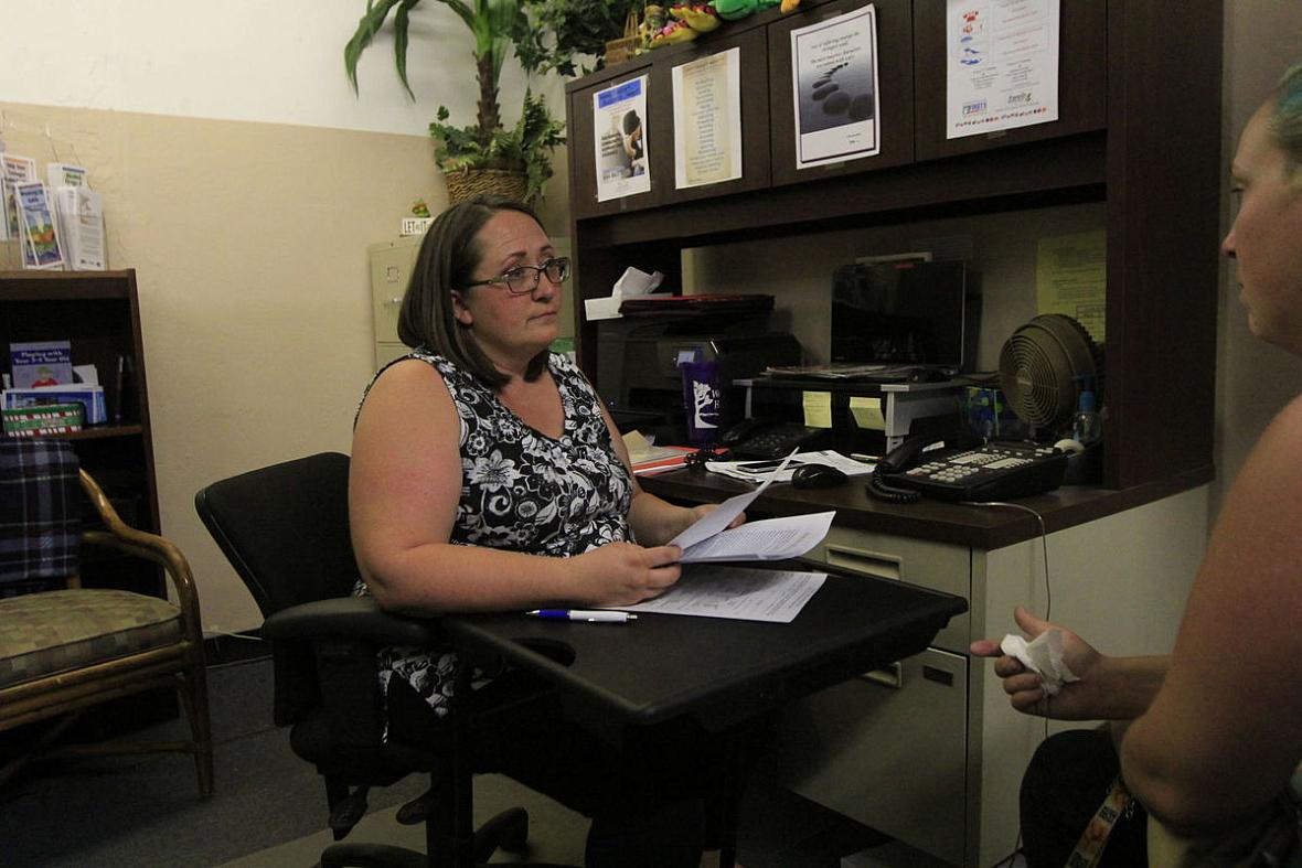 Christy Luton, a victims advocate for Women's Center High Desert, assists a woman facing domestic violence. Once a victim herself, Luton has overcome much of the same childhood trauma so many of her clients have faced. Harold Pierce/The Californian Harold Pierce/The Californian