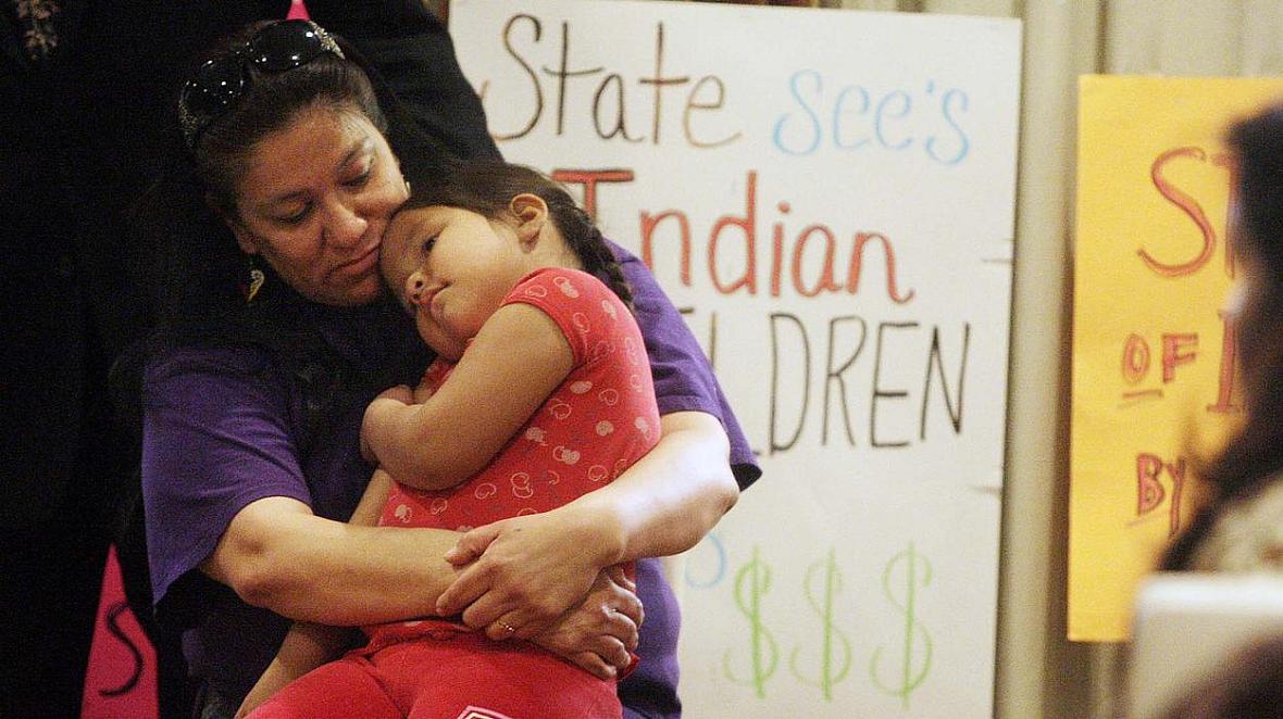 Madonna Pappan and her child in 2013. Pappan was is one of three Sioux mothers who sued South Dakota over its alleged violation of the Indian Child Welfare Act. (AP Photo/Rapid City Journal, Kristina Barker) Madonna Pappan and her child in 2013. Pappan was is one of three Sioux mothers who sued South Dakota over its alleged violation