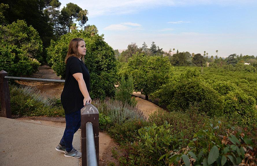 Sally Cardinale, 36, of Redlands, takes a moment to reflect during a walk on Wednesday, July 19, 2017 at Prospect Park in Riverside, Ca. Cardinale, a survivor of the Dec. 2, 2015 terror attack in San Bernardino, says regular walks in nature have aided in her PTSD recovery. (Micah Escamilla, Press Enterprise, SCNG) Micah Escamilla, Press Enterprise, SCNG