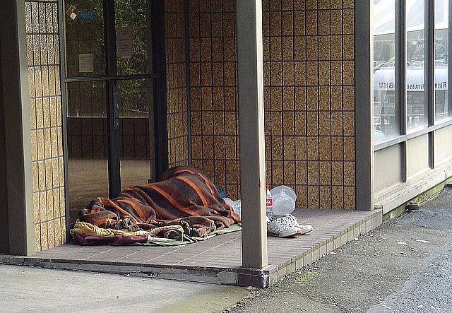 homeless individual sleeping outside