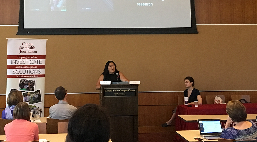 Ashley Alvarado, director of community engagement at Southern California Public Radio, speaks to reporters along with Ariana Tobin, engagement editor and reporter at ProPublica, at right. (Photo by CHJ)