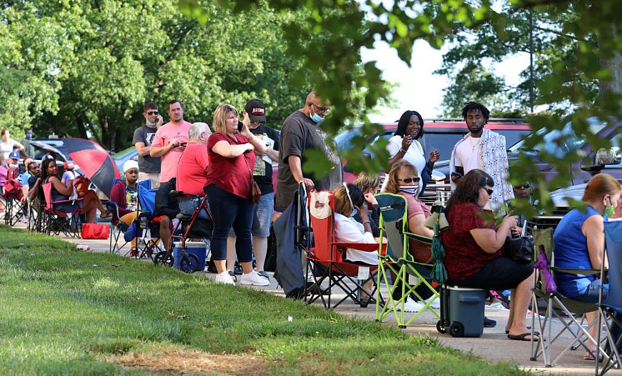 Hundreds of unemployed residents wait in long lines outside the Kentucky Career Center for help with their unemployment claims Frankfort, Kentucky Hundreds of unemployed residents wait in long lines outside the Kentucky Career Center for help with their unemployment claims F
