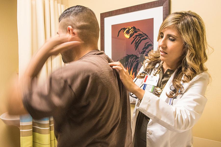 Dr. Olga Meave, who studied medicine in Guadalajara, Mexico before completing her residency in Bakersfield, sees a patient. Nearly half the San Joaquin Valley’s 5,000 doctors are international medical graduates, which leaves the region’s doctor pipeline vulnerable to changes in immigration policy. (Photo by Kerry Klein) Photo by Kerry Klein