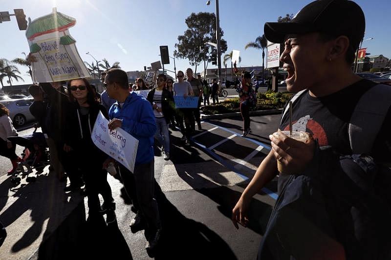My Nguyen marches in a Little Saigon rally in 2018 against the Trump Administration’s attempt to change and violate the repatriation agreement between the U.S. and Vietnam. That would have put 8,500 Vietnamese Americans at risk of deportation.(Genaro Molina / Los Angeles Times)