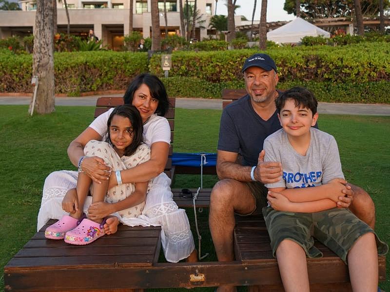 Lilian Ansari, shown here on vacation with her family pre-pandemic, feels at times that managing the needs of her children without the usual support feels “pretty unbearable.”