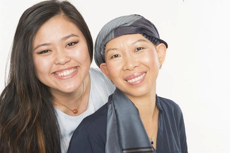 Angkearoth Leap, right, says that she relied heavily on the Cambodian Family’s Cindy Sicheang Phou, who previously worked as a health navigator supported Leap through her breast cancer treatments.(Photo by Bong Roth)