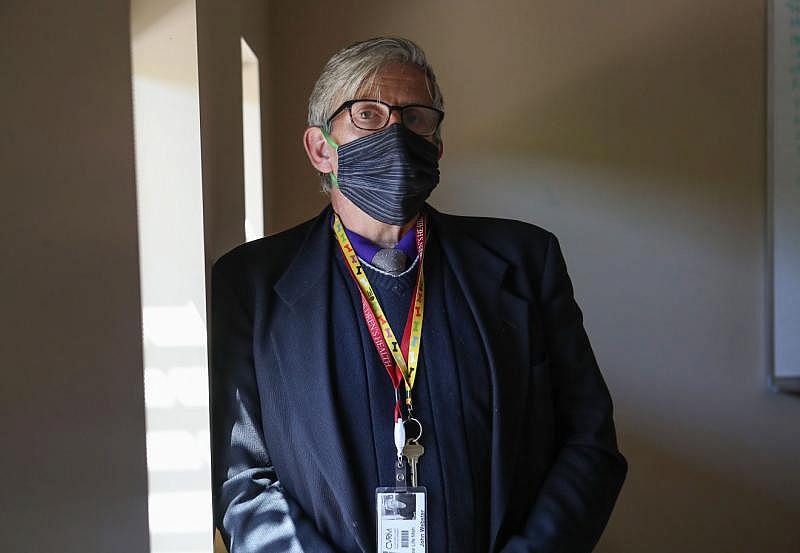 John Webster wears a facemask while living and working at the Coachella Valley Rescue Mission in Indio, April 16, 2020.Jay Calderon/ The Desert Sun