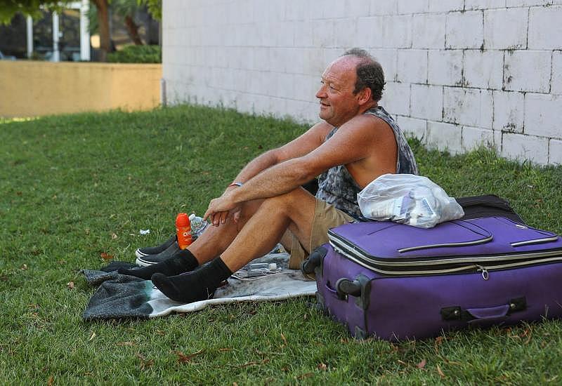 George Smith tries to stay cool during triple-digit temperatures in the shade of a wall at Sunrise Park after the closure of the overnight shelter for the homeless in Palm Springs, September 30, 2020. Jay Calderon/The Desert Sun George Smith tries to stay cool during triple-digit temperatures in the shade of a wall at Sunrise Park after the closure of the overnight shelter for the homeless in Palm Springs, September 30, 2020. Jay Calderon/The Desert Sun