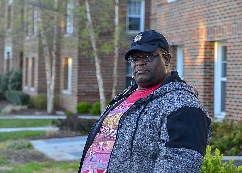 Leon Lightfoot, who has lived in Dahlgreen Courts Apartments with his family since 1999, stands in front of the building. Lightfoot said that his wife and son have asthma and that he has headaches and other respiratory problems. (Freddie Allen/AMG/NNPA) Leon Lightfoot, who has lived in Dahlgreen Courts Apartments with his family since 1999, stands in front of the building. Lightfoot said that his wife and son have asthma and that he has headaches and other respiratory problems. (Freddie Allen/AMG/NNPA)