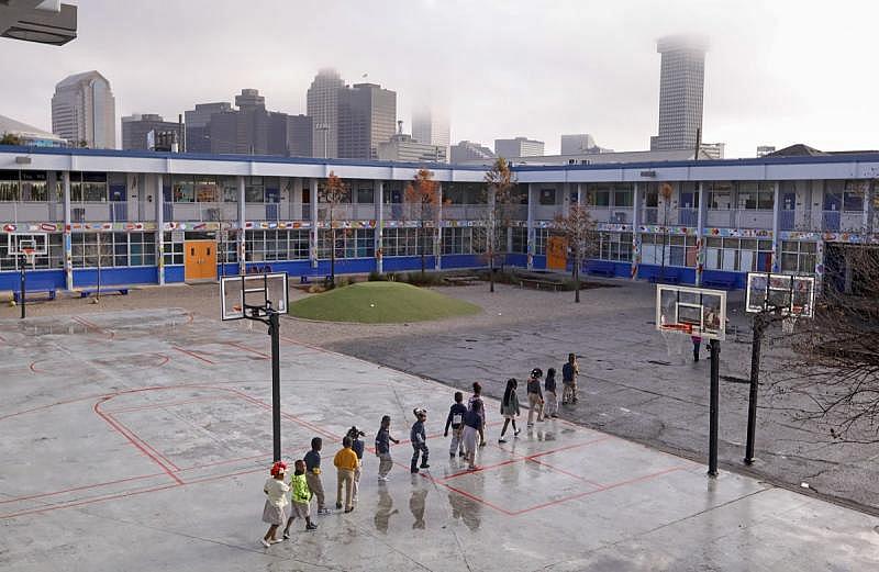 Students walk across the campus at KIPP Central City Primary.