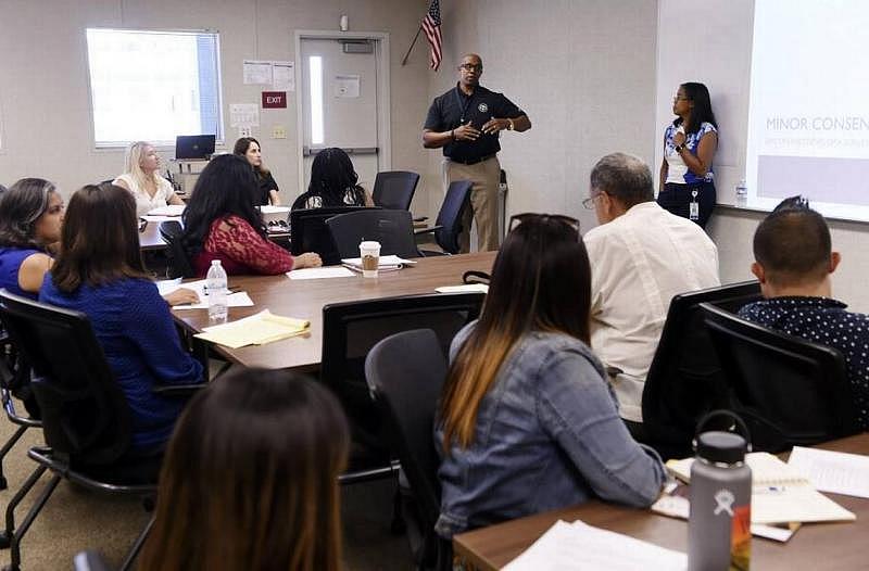 Jeff Hunt, top left, and Alma McKenry, top right, lead the discussion during Fresno County Preterm Birth Initiative's health and education meeting Tuesday, Sept. 12, 2017 in Fresno, CA. Jeff Hunt, top left, and Alma McKenry, top right, lead the discussion during Fresno County Preterm Birth Initiative's health and education meeting Tuesday, Sept. 12, 2017 in Fresno, CA.