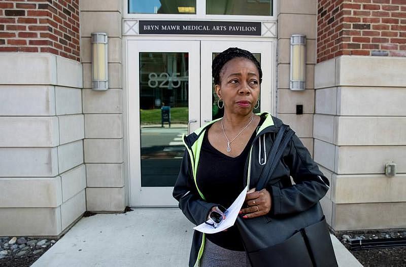 Sharon Bryant, a teacher at the Cassidy school, leaves a medical office after her ear, nose, and throat doctor told her she needs additional testing due to asbestos exposure. Sharon Bryant, a teacher at the Cassidy school, leaves a medical office after her ear, nose, and throat doctor told her she needs additional testing due to asbestos exposure.
