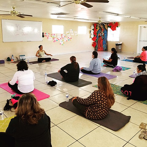 Dulce Juarez offers free yoga classes in Spanish at PUENTE Movement circa 2018,  to create healing spaces for immigrant communities. (Photo by Francisca Porchas, Healing in Resistance)