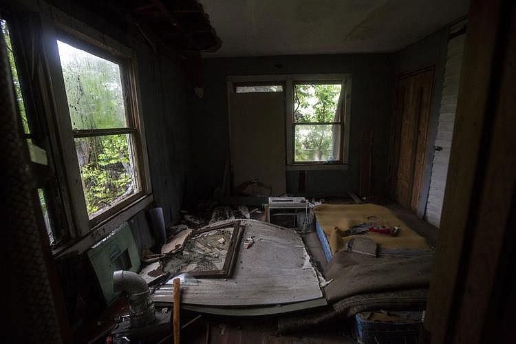 Broken glass from a window is scattered around a bedroom in Reynaldo Garza’s Woodsboro home. (Photo: Angela Piazza/Victoria Advocate) Broken glass from a window is scattered around a bedroom in Reynaldo Garza’s Woodsboro home.