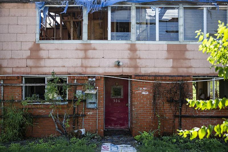 A house on West Street in Bayside is missing sections of roof and wall. The windows are broken, and vegetation grows over trash inside. (Photo Credit: Angela Piazza/Victoria Advocate) A house on West Street in Bayside is missing sections of roof and wall. The windows are broken, and vegetation grows over trash inside.