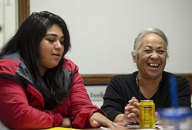 Amairany H, left, cracks up counselor Sylvia Jacques, during an otherwise serious support group for pregnant women and mothers who are dealing with addiction. The meetings are run by the non-profit Mariposa which specializes in women’s health. (Photo by Mindy Schauer, Orange County Register/SCNG)