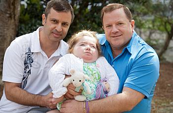 Bruce Steiger, left, and Rick Karl, with their late daughter Krystie.