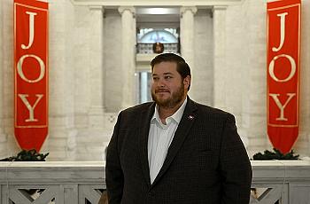 Ben Gilmore poses for a photo in the Second floor rotunda of the Arkansas State Capitol on Friday, Dec. 17, 2021.