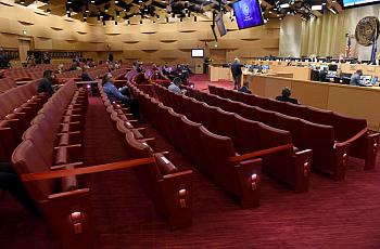 A city council meeting in Las Vegas, where every other row of seats was blocked off for social distancing.