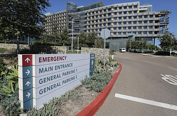 A sign points the way to the emergency room at Palomar Medical Center Escondido. 