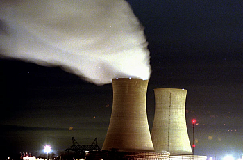 Clouds spew from a cooling tower at PECO’s nuclear generating station.