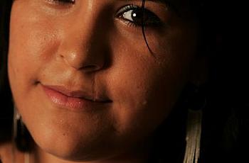 Cristina Mendez-Diaz, 24, bears the scars of the danger she fled in Mexico. During a deportation hearing, she was unable to spea