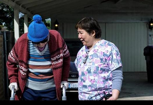 Emma with her 91-yr old client who she cares for five days a week. (Photo credit: Seth Hernandez Rongkilyo/Filmmaker)
