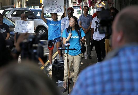 Sookyung Oh spoke in July about language access problems during the Unemployment Action Coalition’s protest against the Virginia